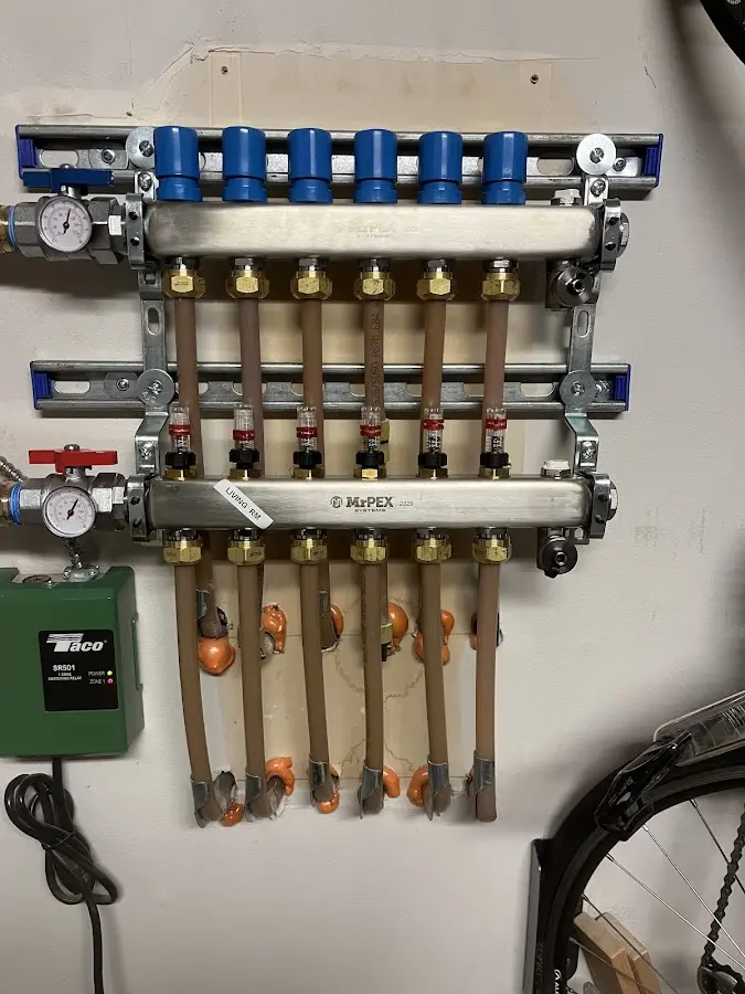 Plumber performing Leak Detection at a residential property in Elmwood